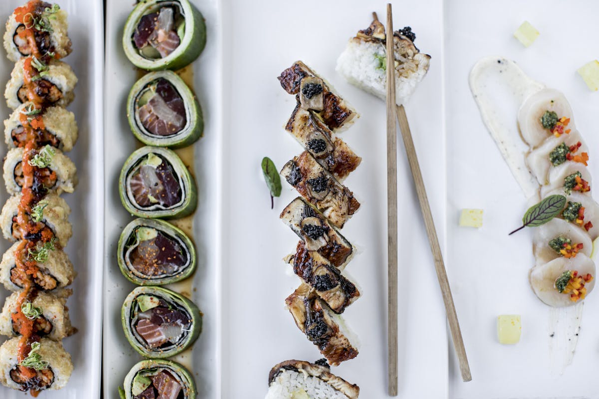 a bunch of different types of food on a table