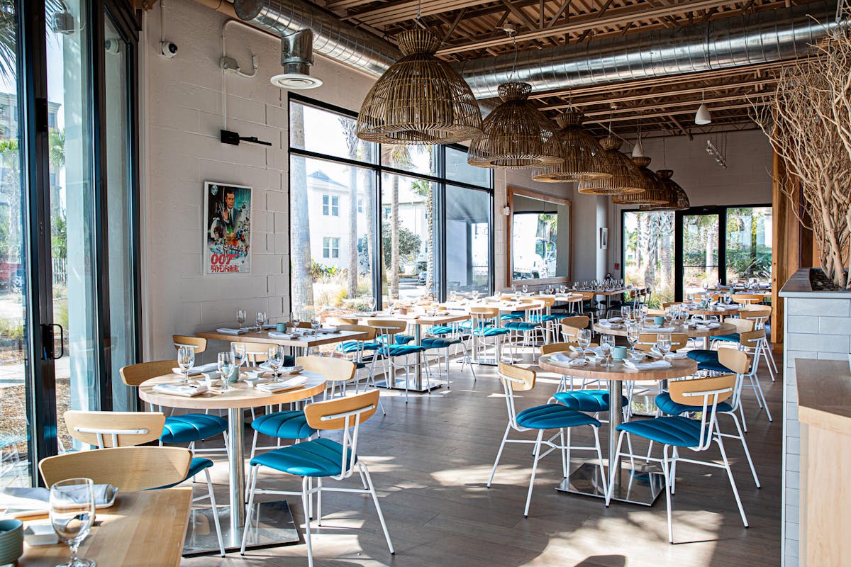 a dining room table in front of a building