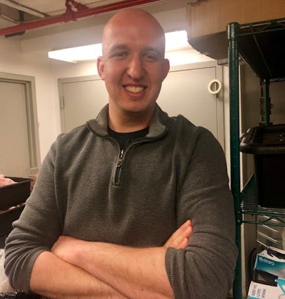 a man smiling for the camera
