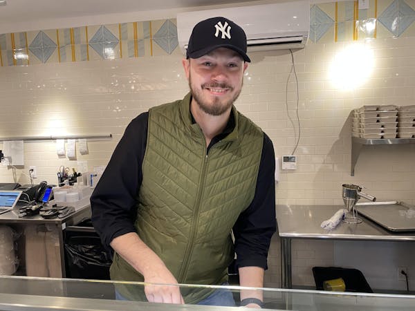a man standing in a kitchen