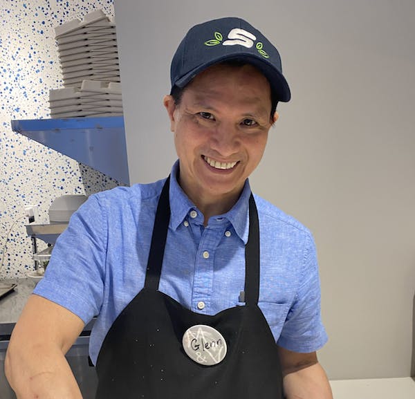 a person wearing a blue hat