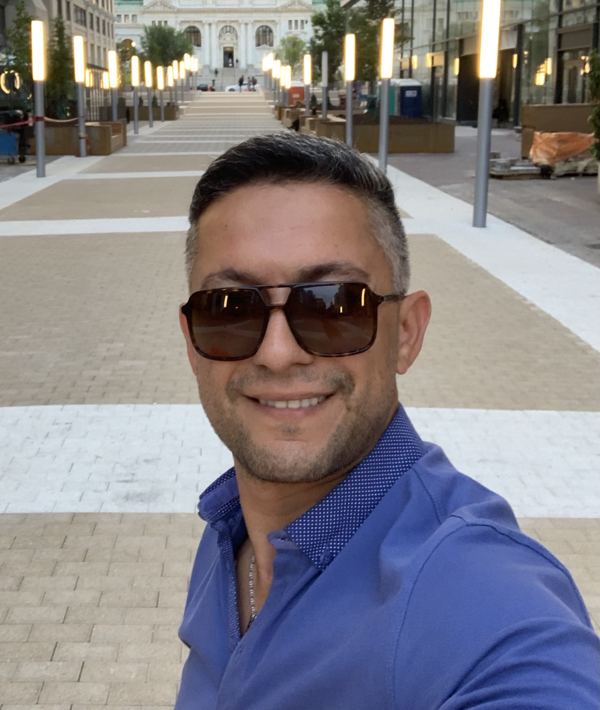 a man smilling for the camera