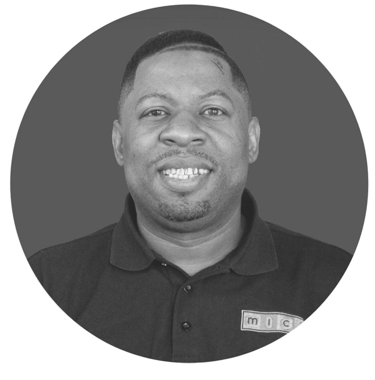 a man smiling for the camera