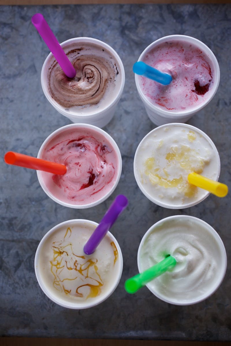 a close up of different types of shakes