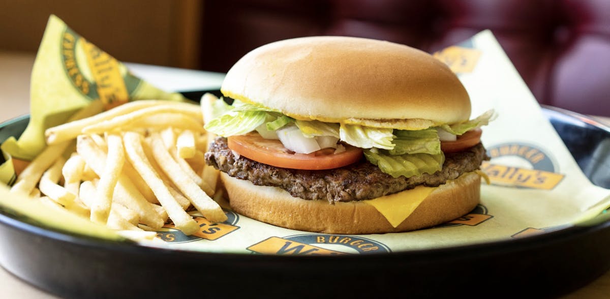a sandwich and fries on a plate