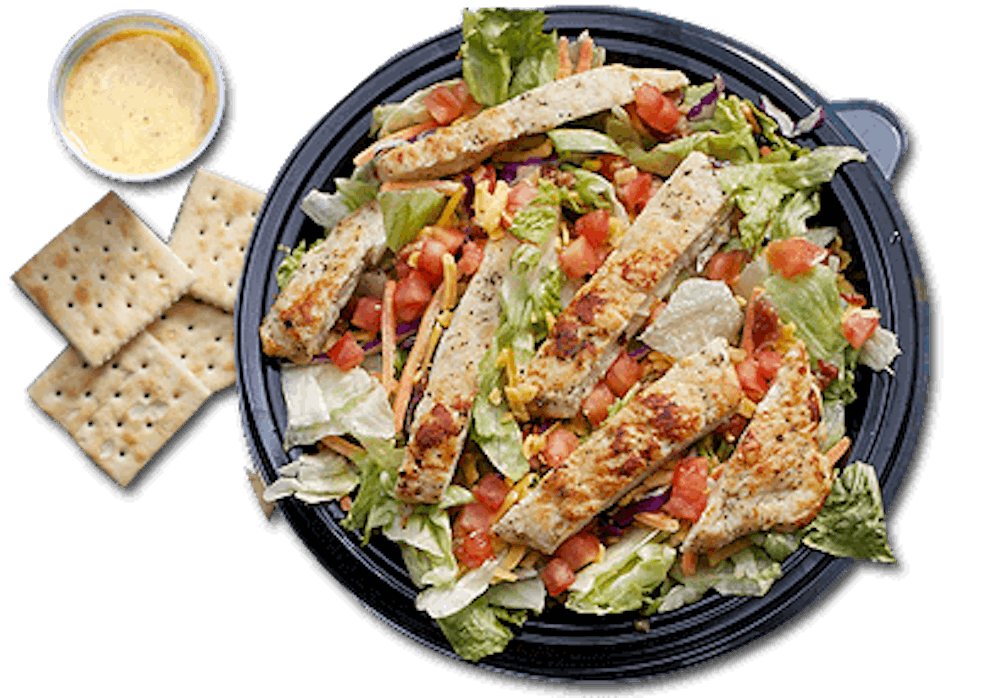 a bowl of salad on a plate