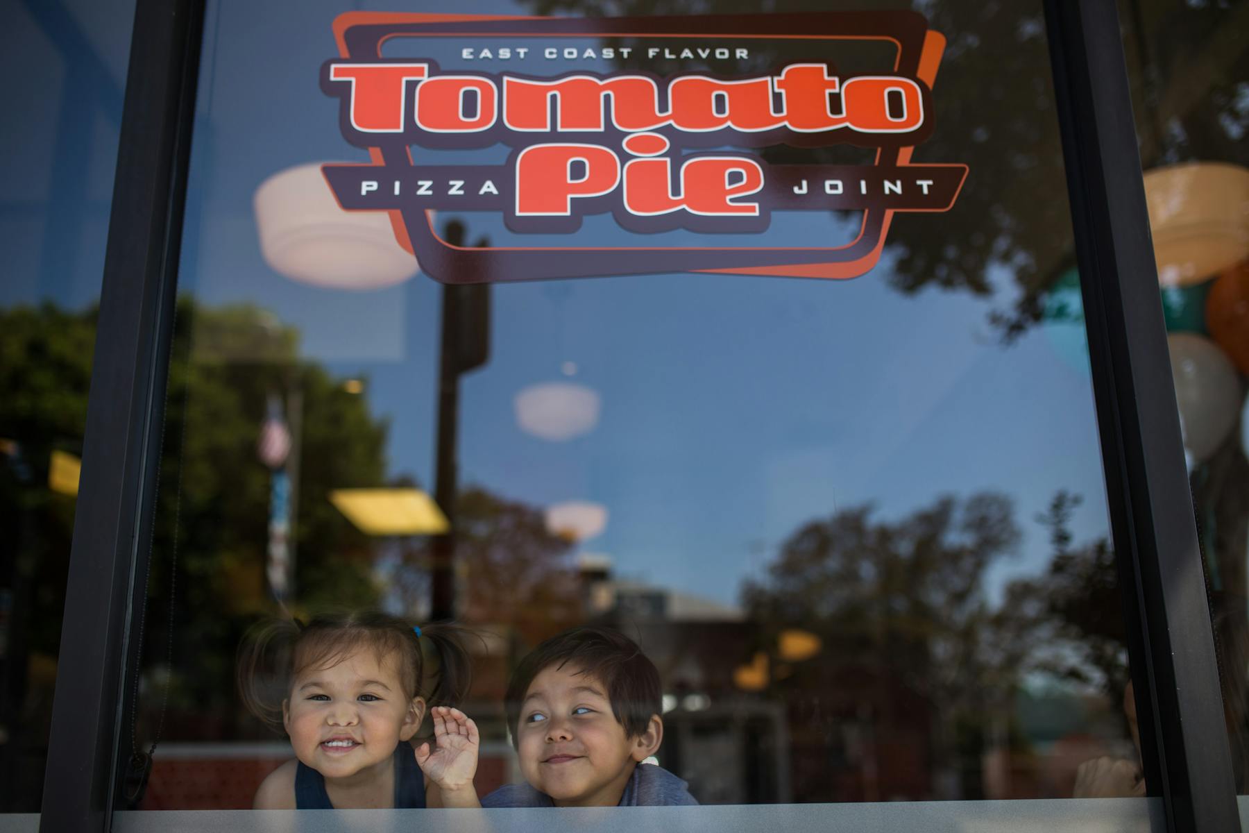 kids in a window