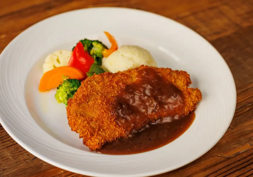 Pork Cutlet with Gravy Roots Kitchen & Bar