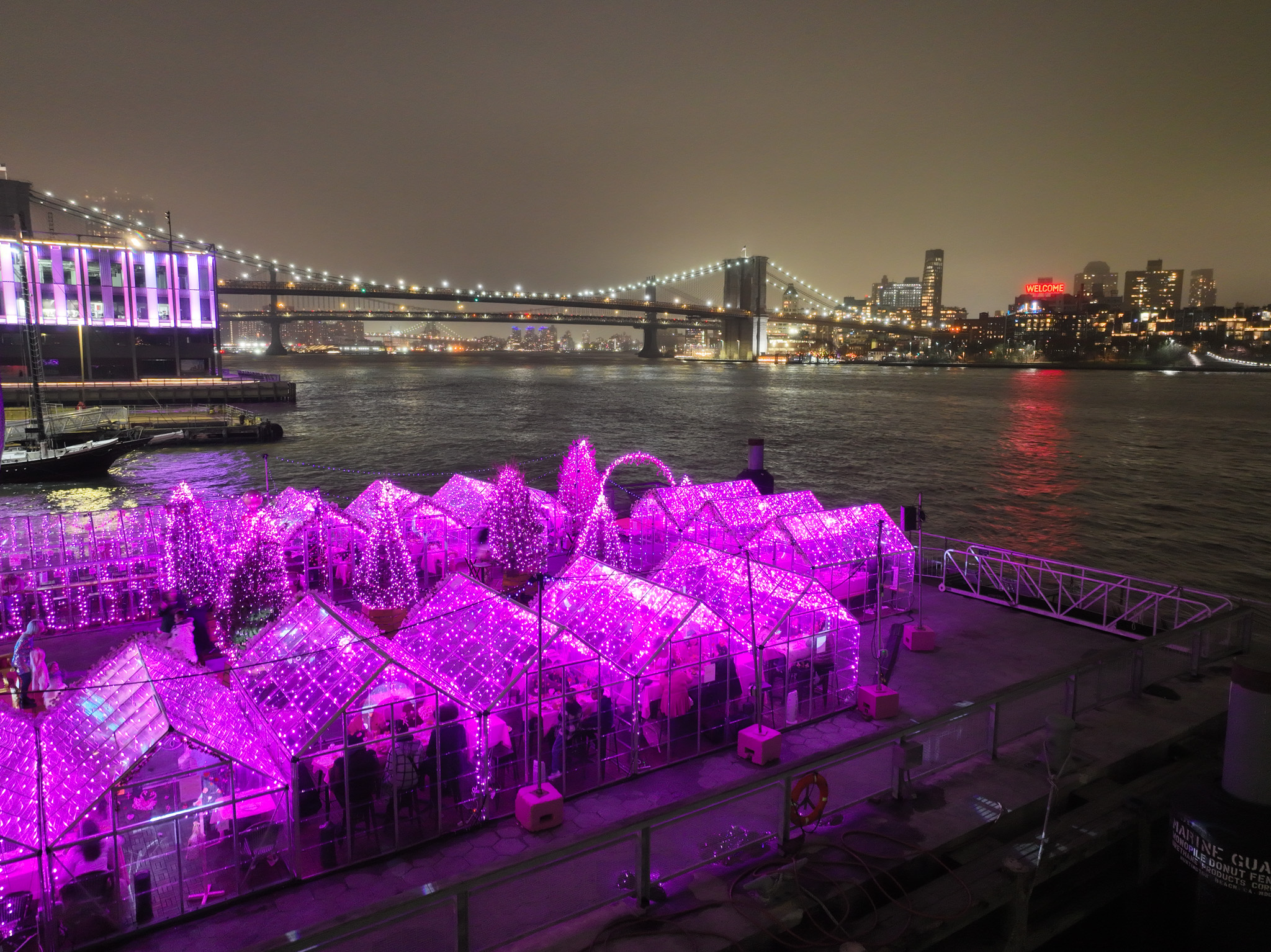 Drone view of Watermark Pier 15 set up with Pink Pier installations and waterfront seating