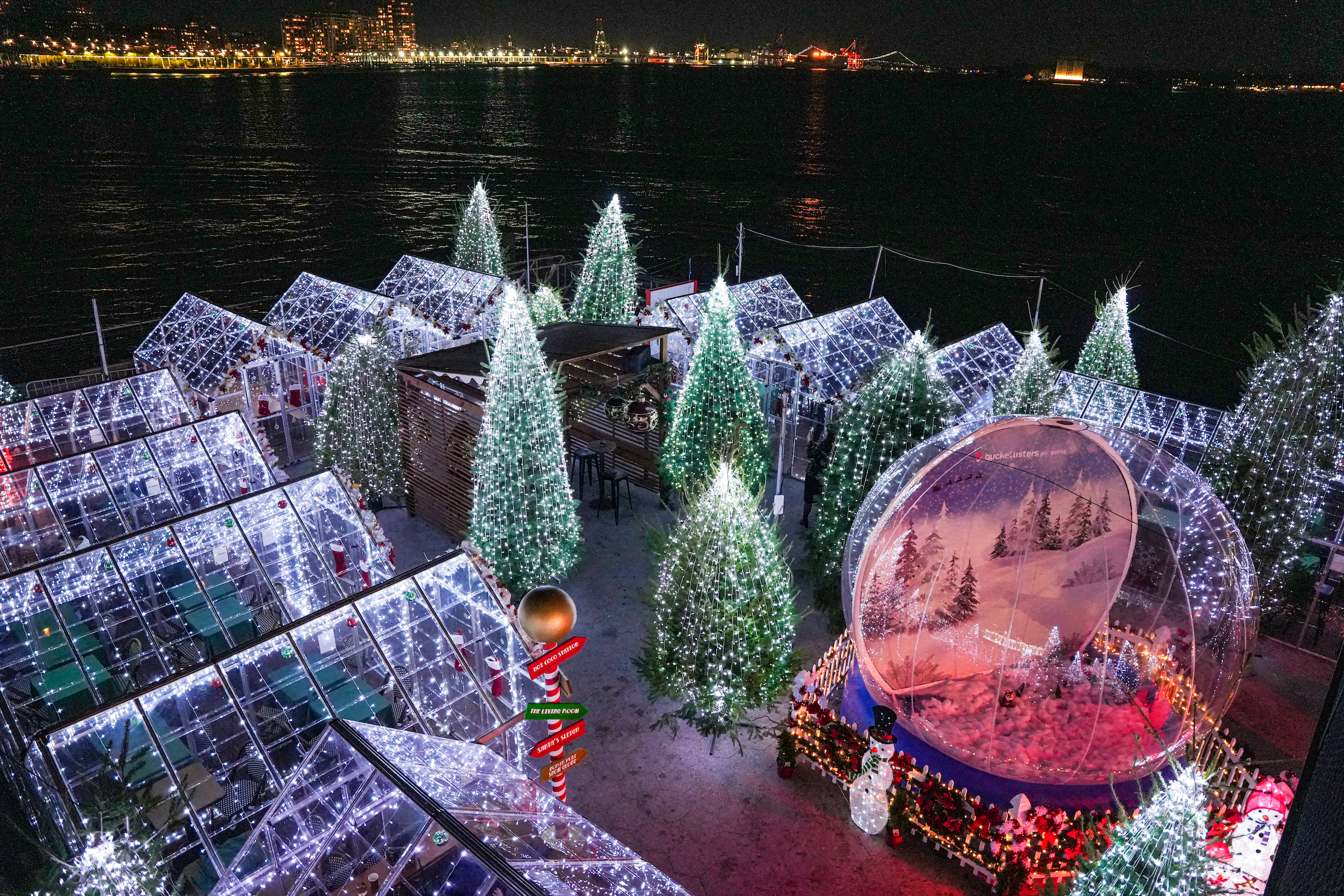 Pier view with holiday lights and décor at Watermark