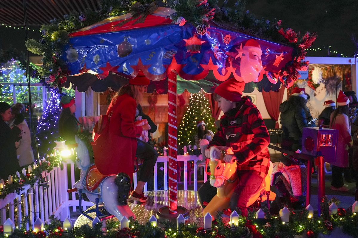 Holiday carousel and festive lights at Watermark Pier 15