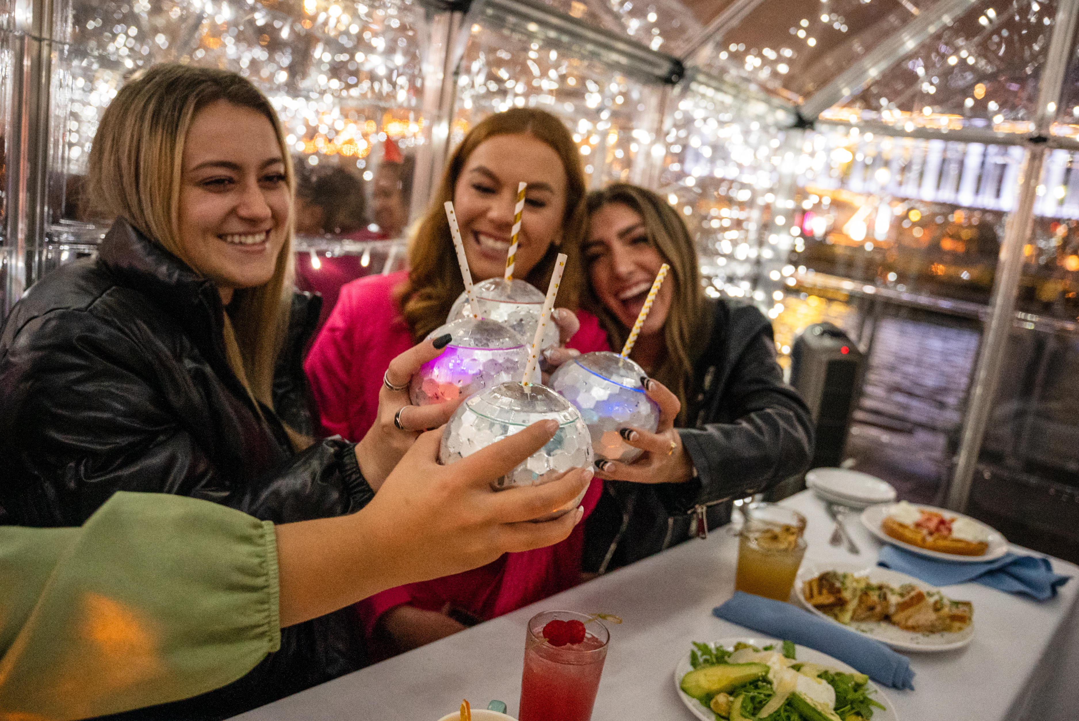 Guests enjoying holiday lights and decorations
