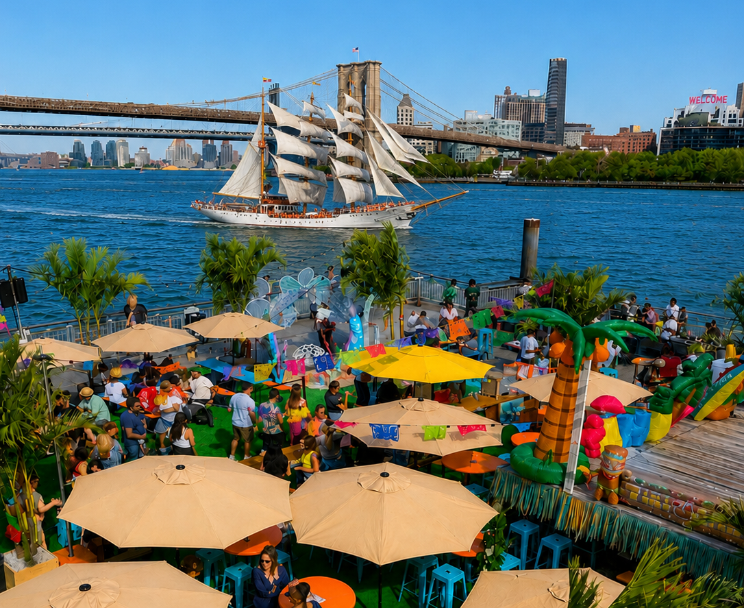 Tall ship sailing on the East River near the Brooklyn Bridge with guests gathered at Watermark Beach.