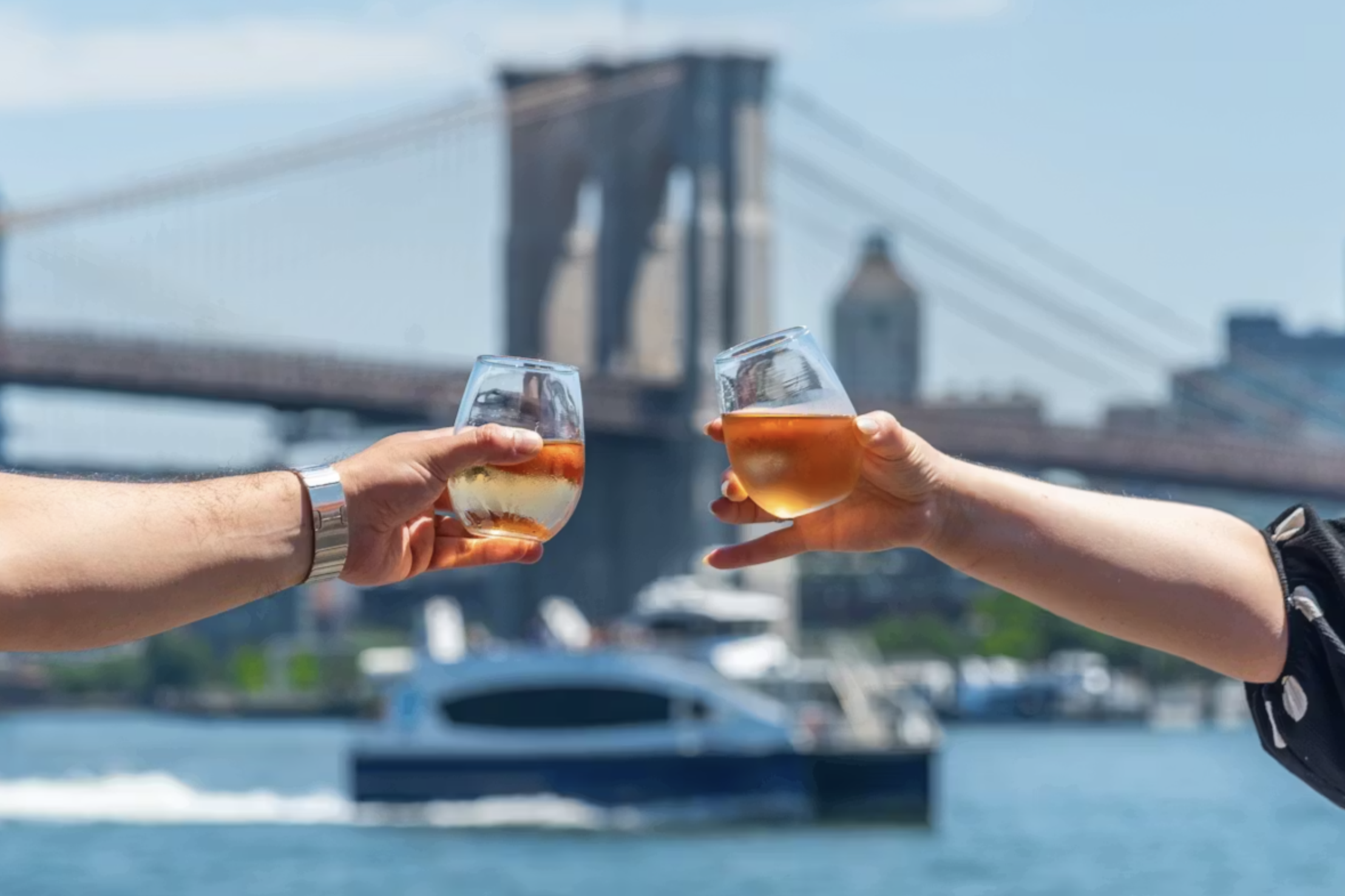 Guests toasting drinks at Watermark Beach