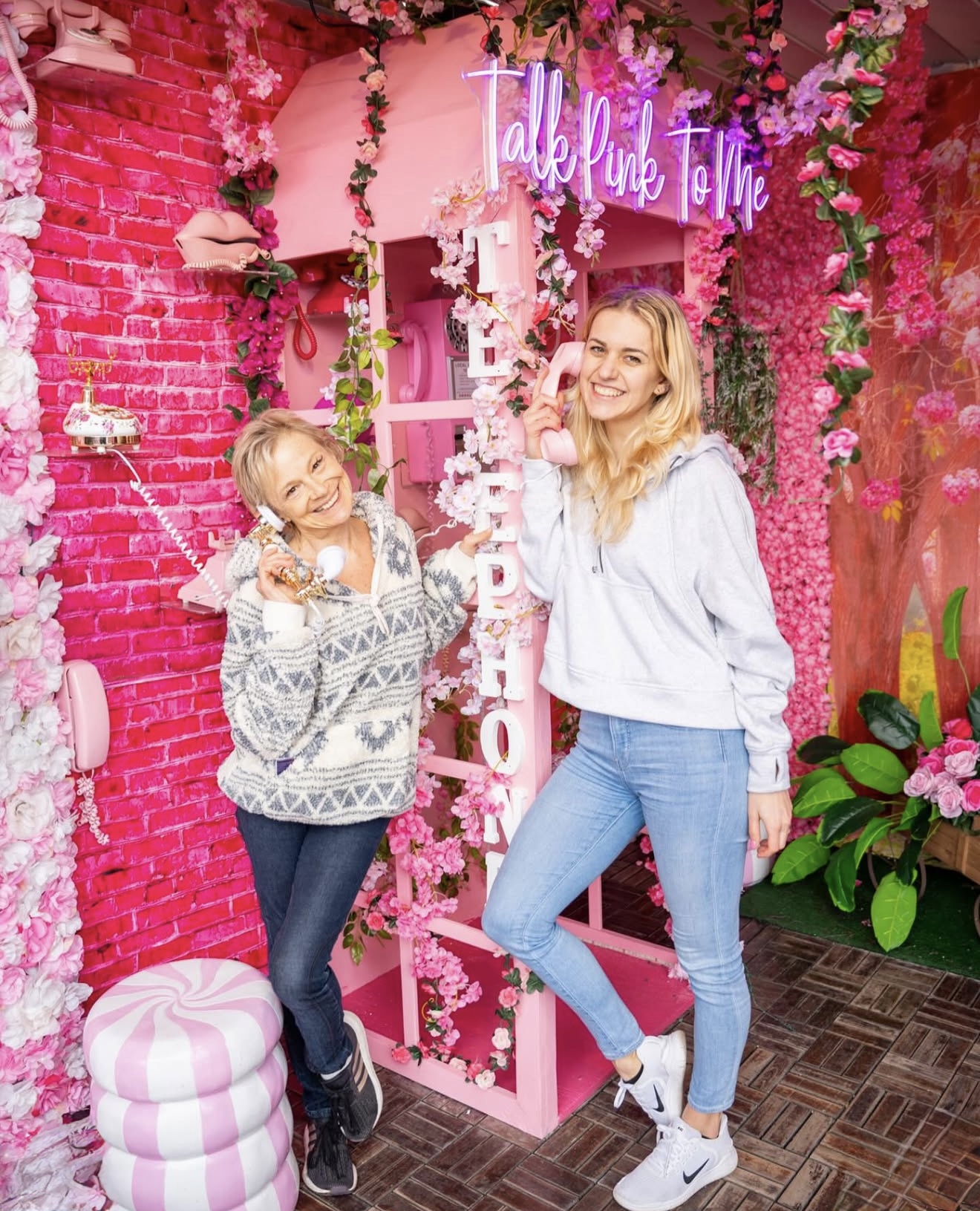 Pink Pier waterfront area with pink decor and seating at Watermark Pier 15
