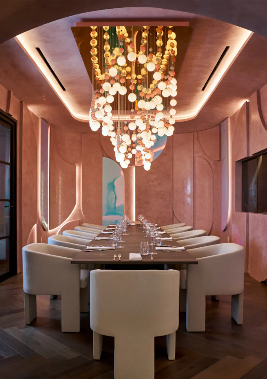 The chandelier of pearl strands above the Chef’s Table at Cocody