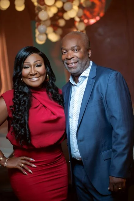 a man and a woman posing for a picture