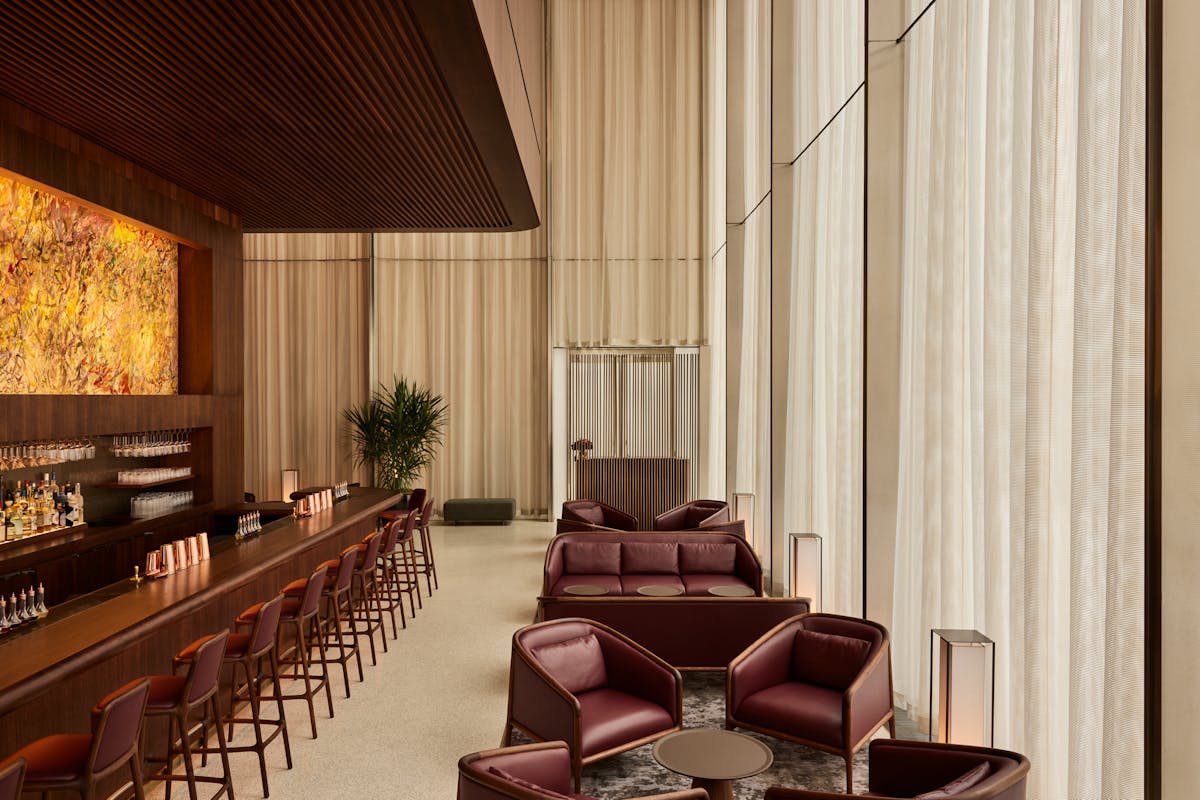 a room filled with furniture and a curtain