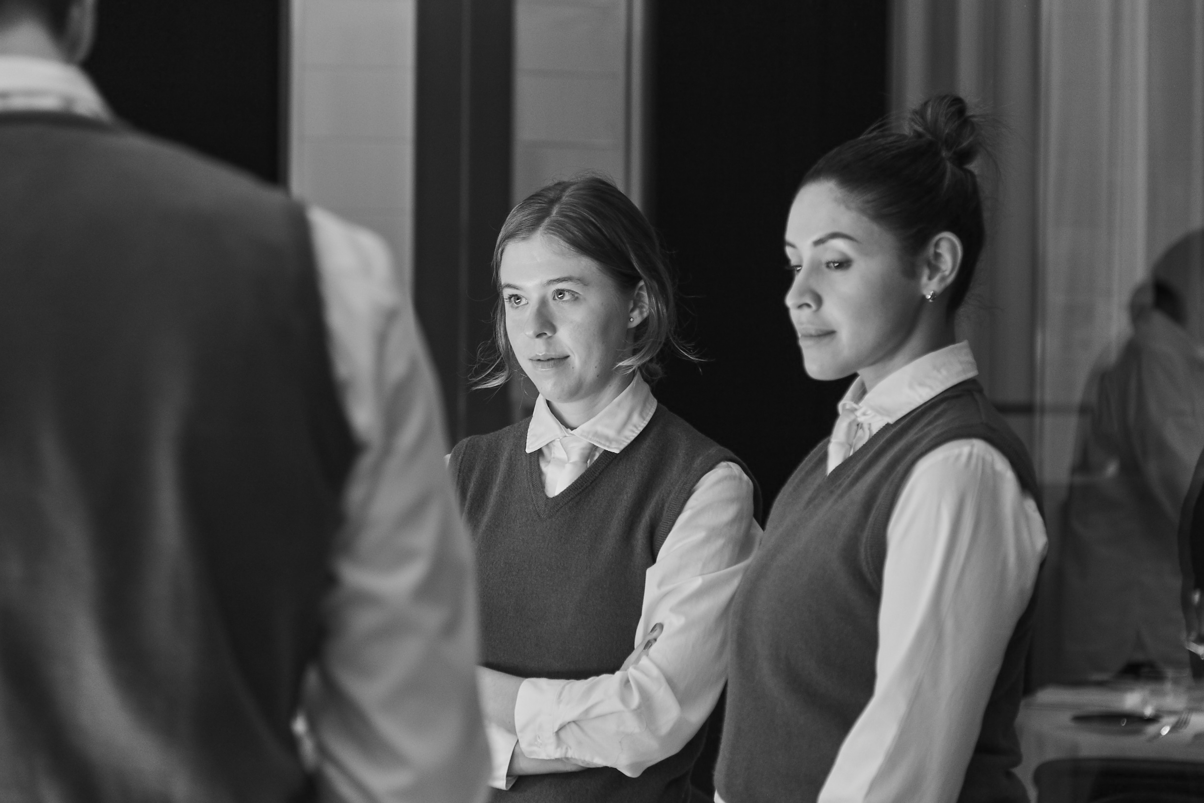 a group of people sitting posing for the camera