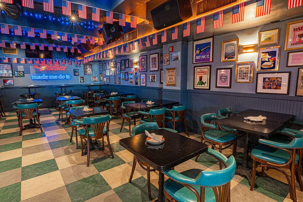 a table topped with a blue umbrella
