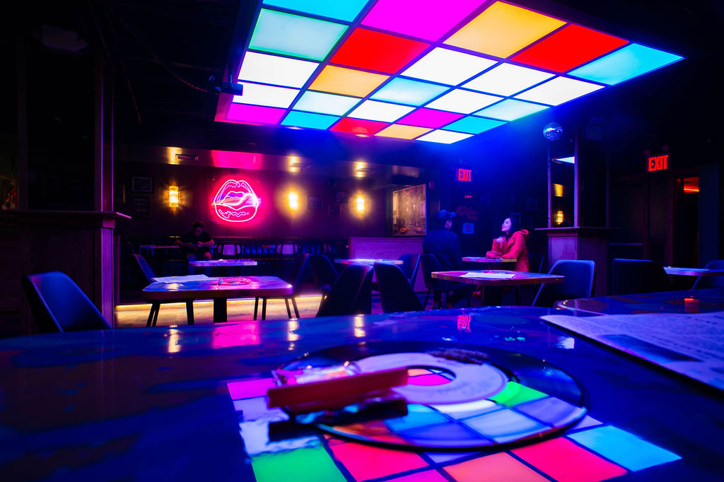 a group of people sitting at night