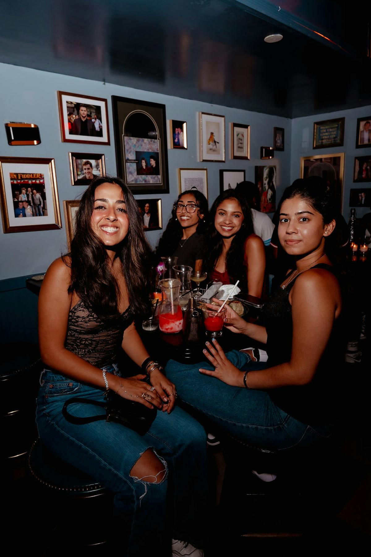 a group of people sitting posing for the camera