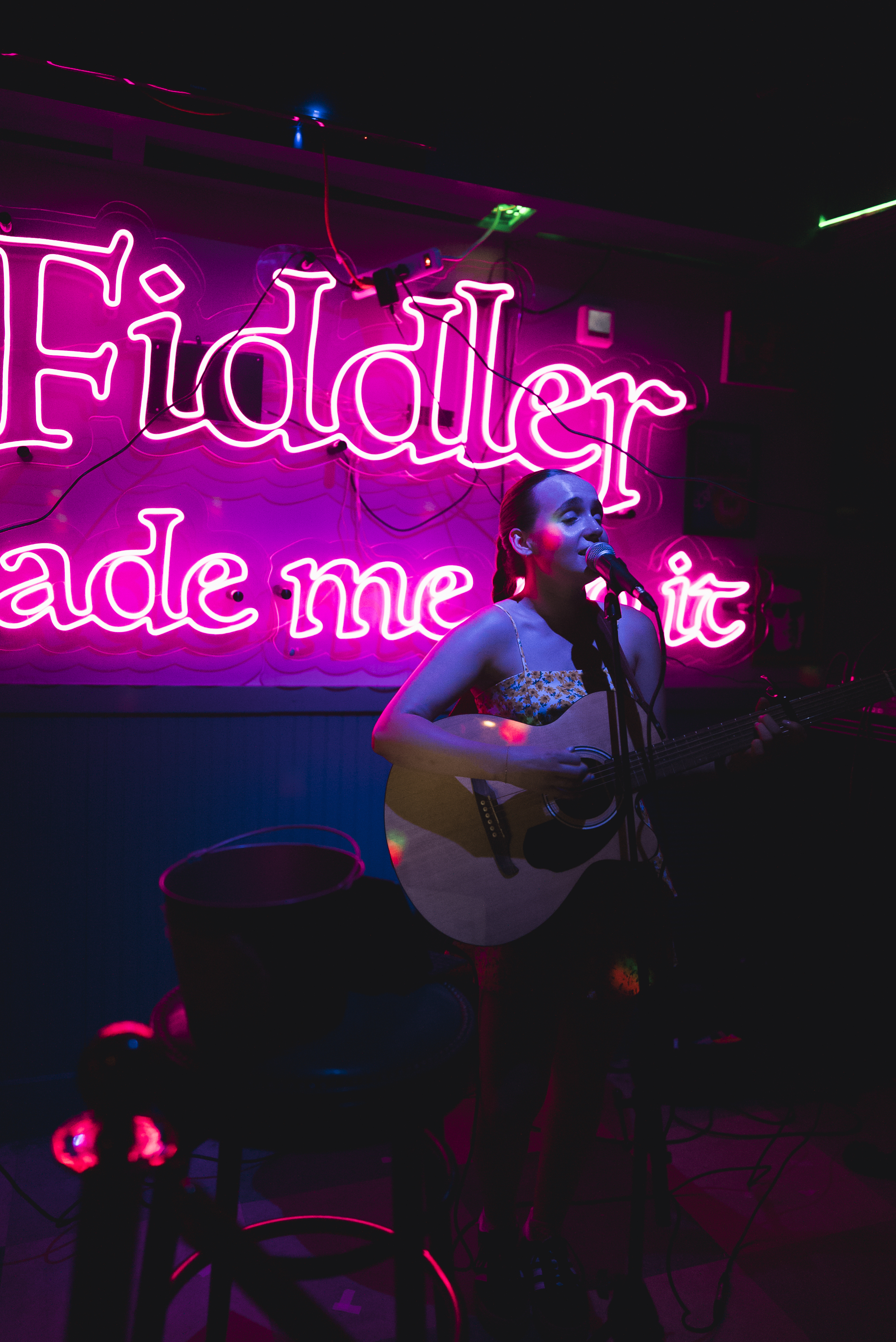 a singer playing guitar