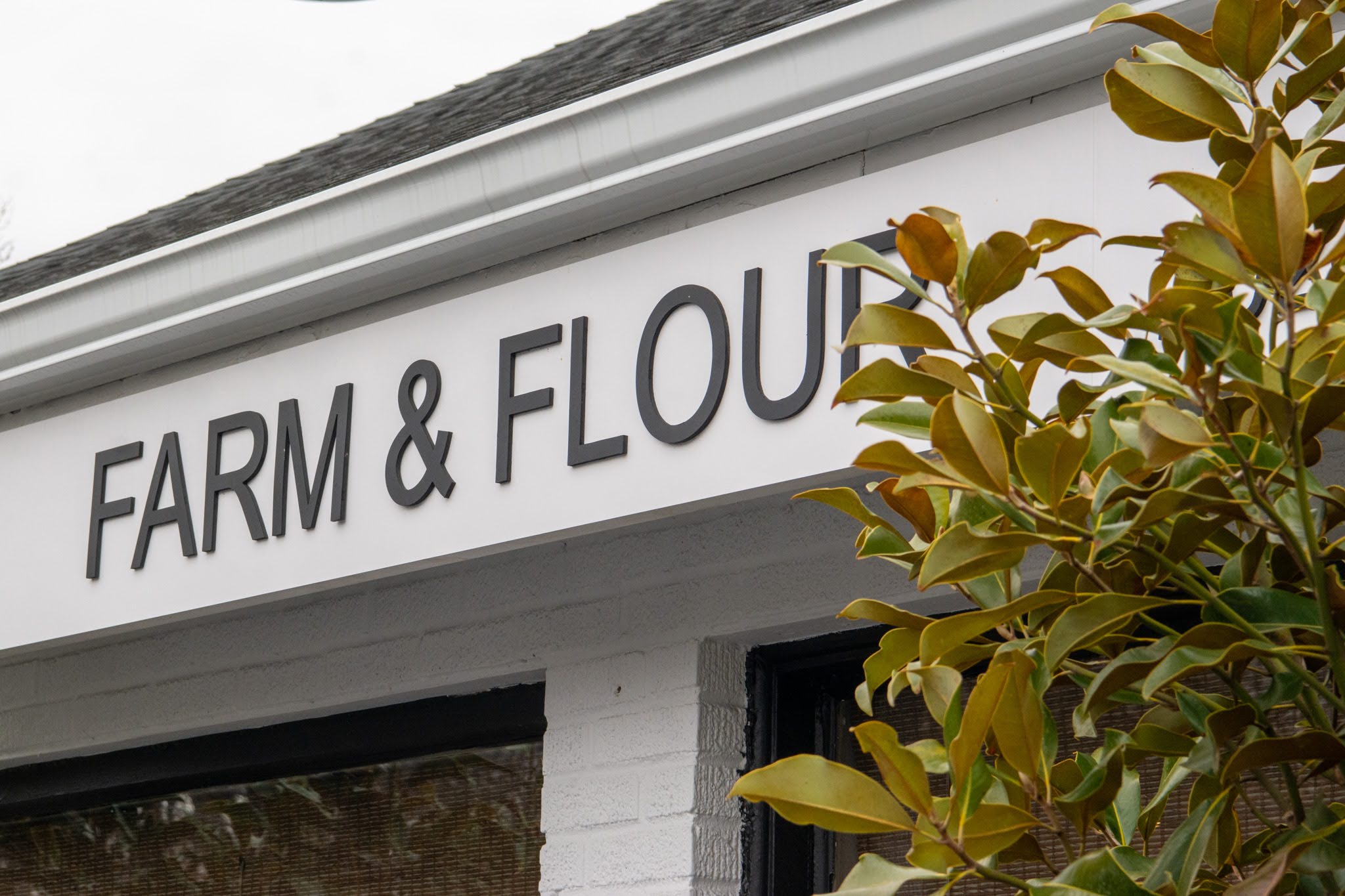 a sign in front of a building