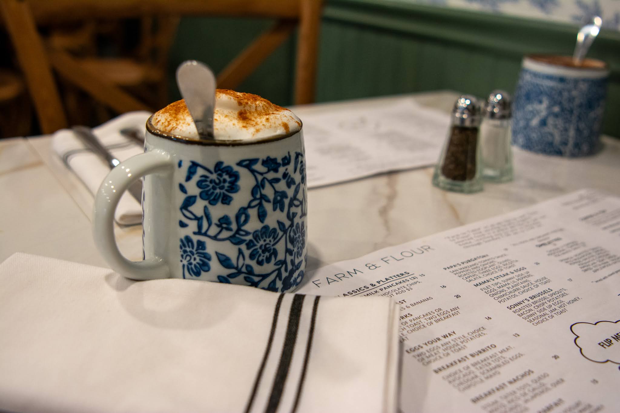 a cup of coffee on a table