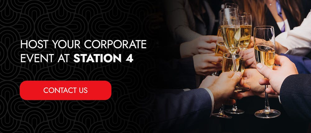 a group of people holding drinks