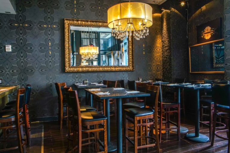 a room with tables and chairs