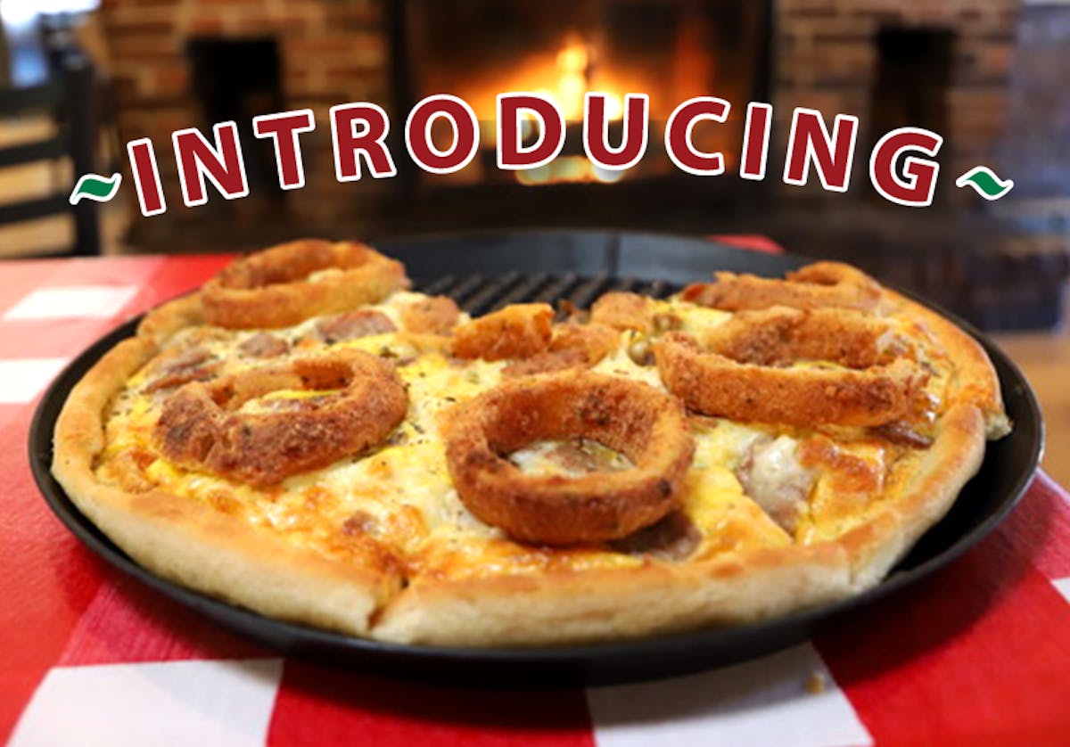 a pizza sitting on top of a table
