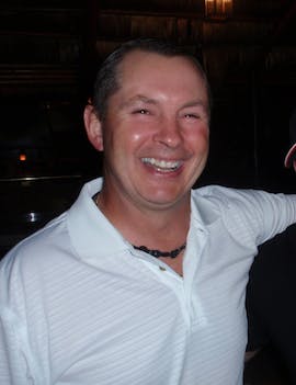 a man smiling for the camera