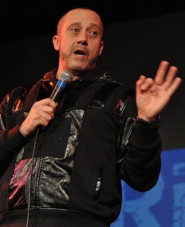 a man holding a microphone