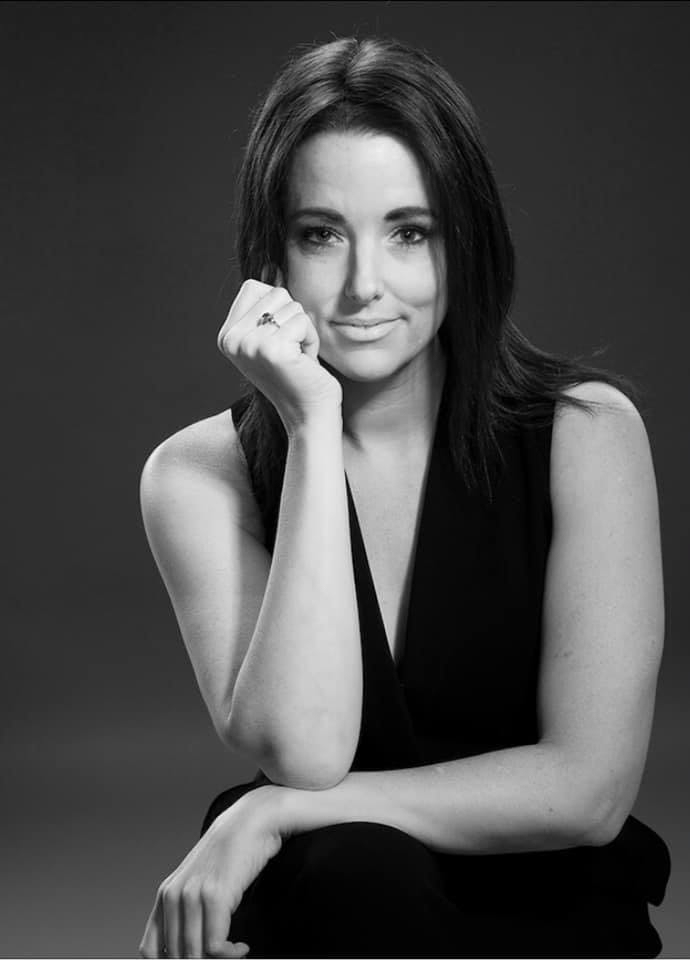 a woman in a black dress