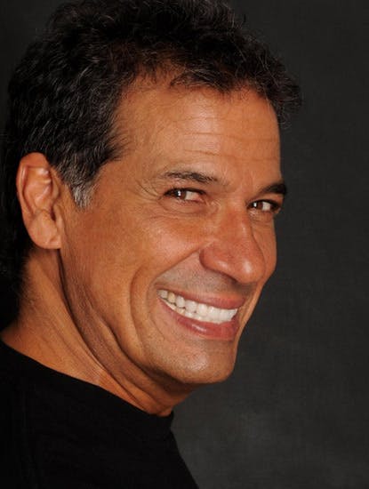 Bobby Collins smiling for the camera