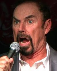 Steve Sweeney wearing a microphone