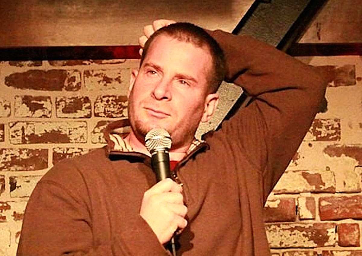 a man holding a microphone