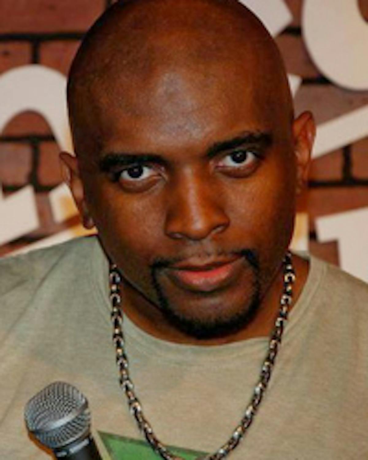 Corey Manning wearing a microphone