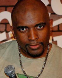 Corey Manning wearing a microphone