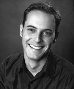 a man smiling for the camera