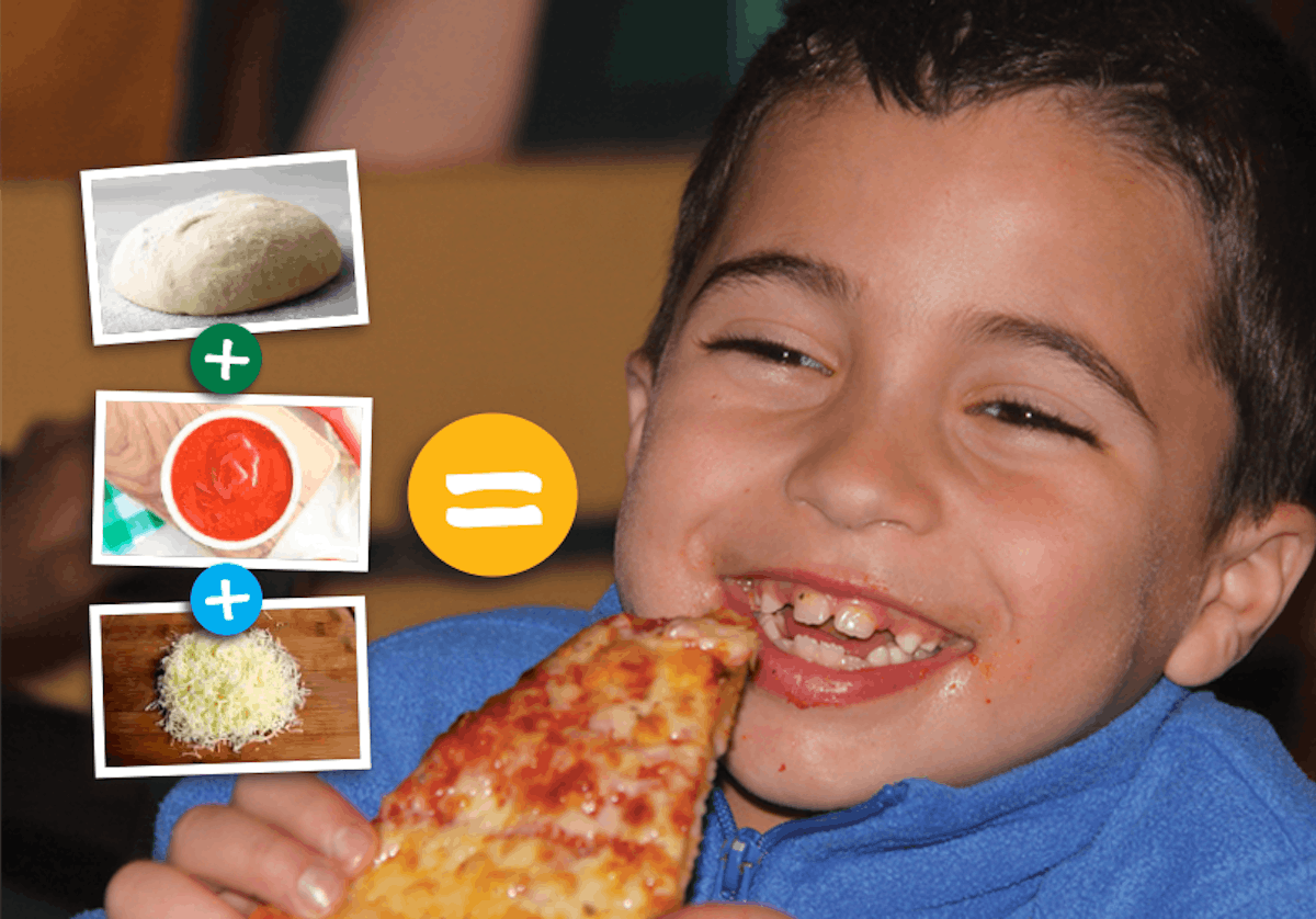 a little boy that is eating some food