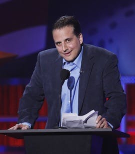 Nick DiPaolo in a suit and tie