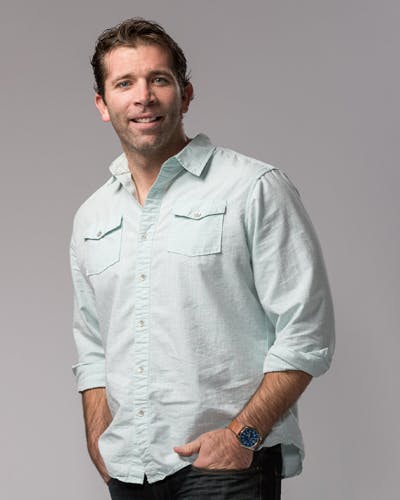 a person standing posing for the camera