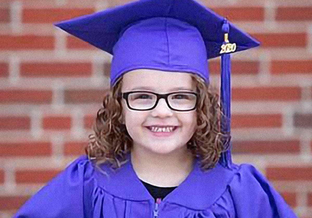 a person wearing a purple hat