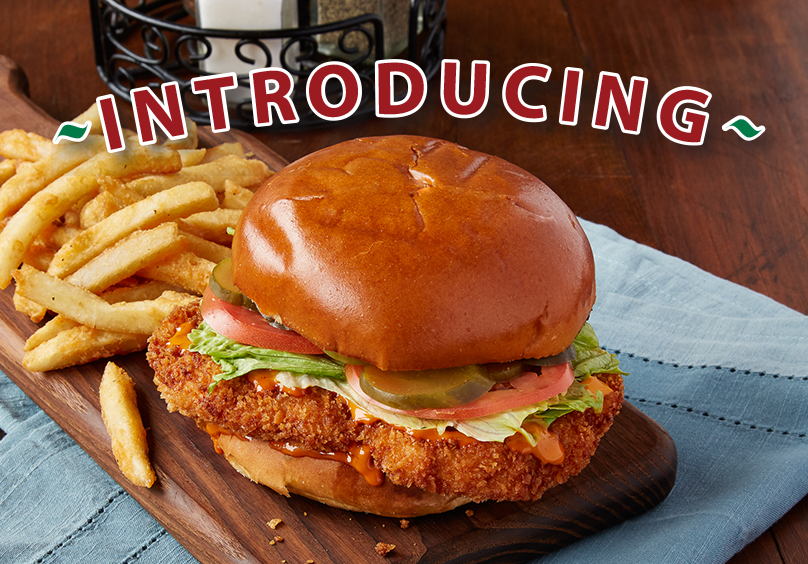 a sandwich sitting on top of a wooden table