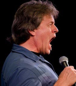 a man holding a microphone