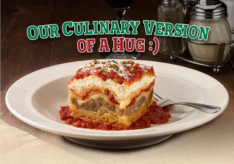 a plate of food with a slice of cake on a table