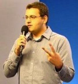 a man holding his hand up