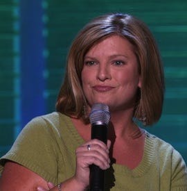 a woman holding a wine glass